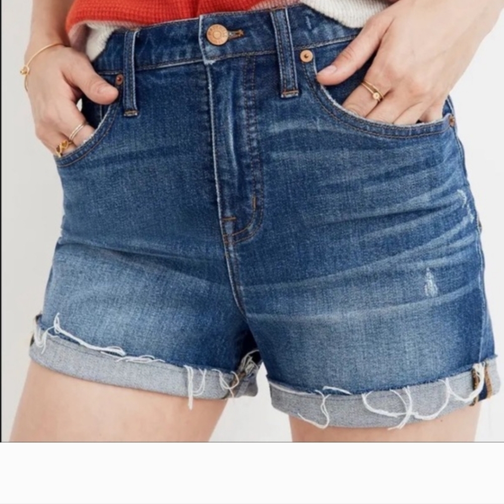 Madewell High-Rise Denim Shorts with a frayed hem in a blue wash. 